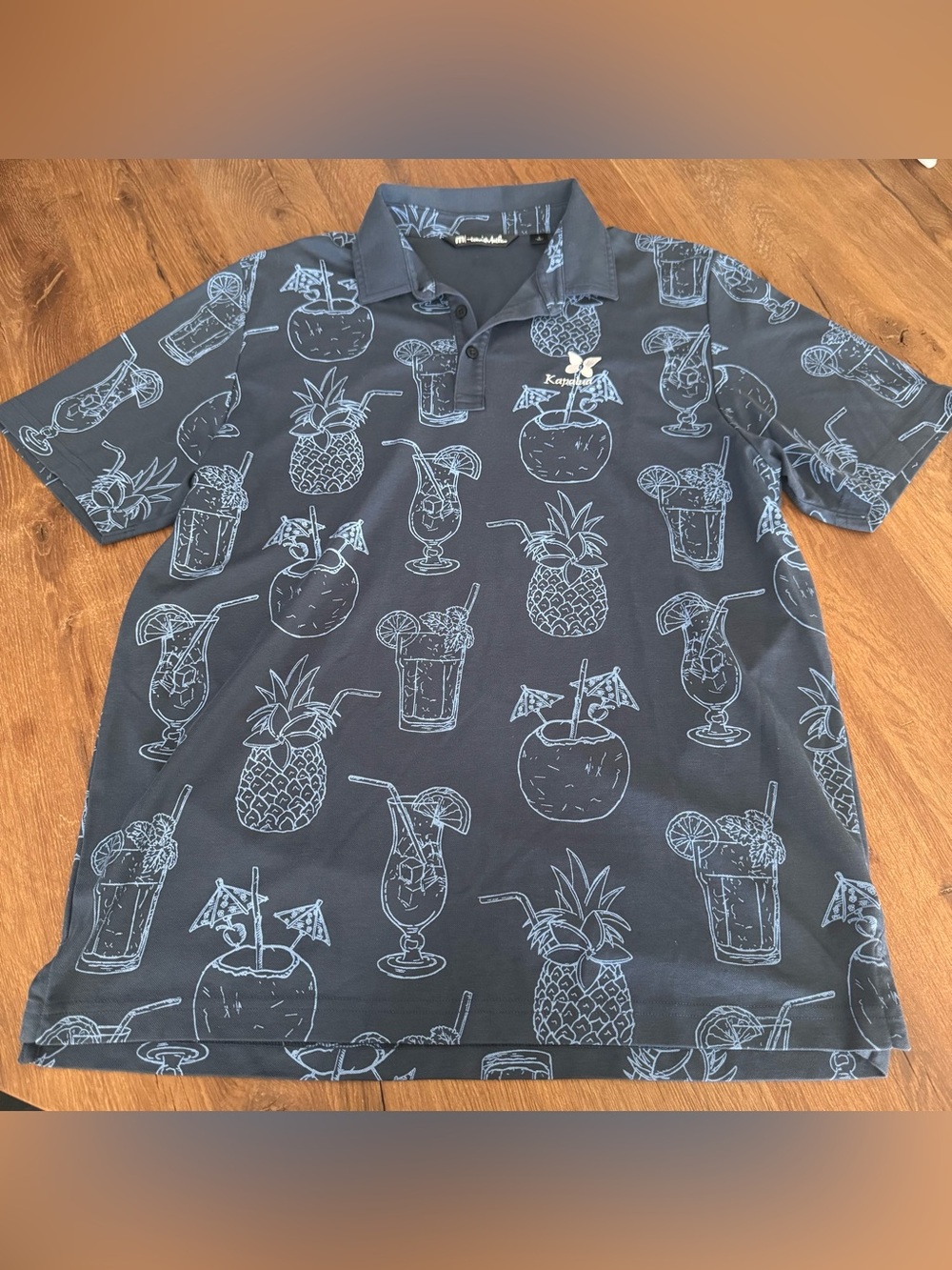 Travis Mathew Men's polo with Kapalua logo